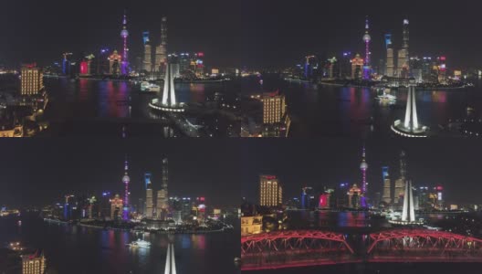 照亮上海市中心的夜晚。陆家嘴区和黄浦江。中国鸟瞰图。无人机正在向上飞行。远景高清在线视频素材下载