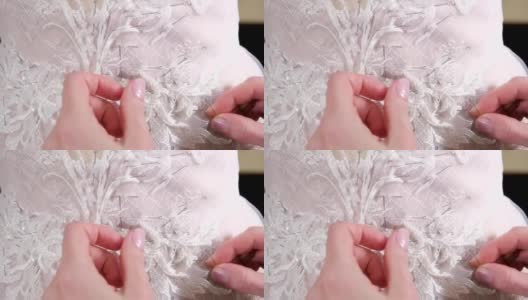 针线特写，绣花图案。用于缝制优雅婚纱的设备。手工制作的高清在线视频素材下载