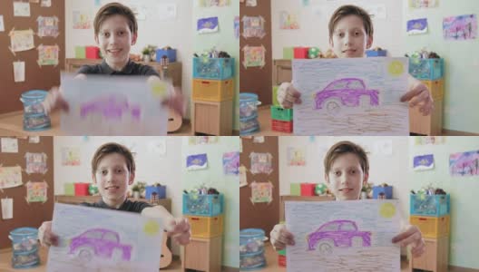 可爱的微笑的男孩展示照片的汽车看着相机高清在线视频素材下载