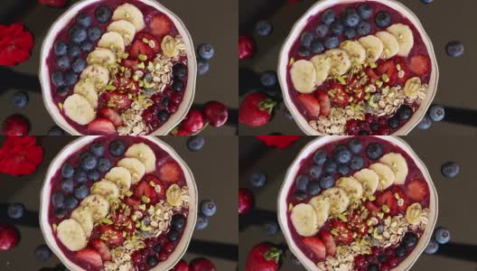 旋转的巴西莓碗和水果，闭合高清在线视频素材下载