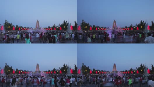 2013年6月27日，中国陕西省西安市，游客在大雁塔喷泉广场。高清在线视频素材下载
