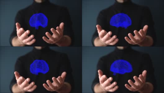 大脑全息图。在人类科学家或用户手中旋转大脑的虚拟3D数字全息图。增强现实，诊断技术，未来科学的概念。高清在线视频素材下载