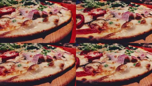 特写的热和新鲜的披萨奶酪，意大利腊肠和芝麻菜高清在线视频素材下载