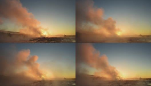冰岛间歇泉喷发。冬天的冷色，阳光透过蒸汽照射高清在线视频素材下载
