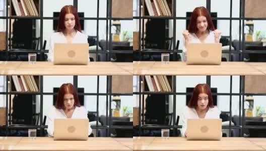 用笔记本电脑工作的成功女人高清在线视频素材下载