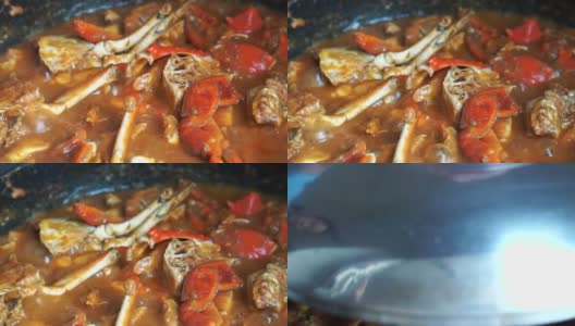 烹制新加坡招牌菜辣椒蟹。受欢迎的海鲜菜肴高清在线视频素材下载