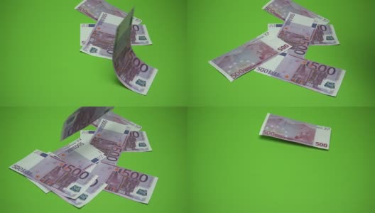 500欧元纸币落在绿色背景上。慢镜头120帧/秒高清在线视频素材下载