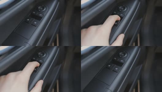 人在现代汽车打开窗户-控制按钮面板细节高清在线视频素材下载