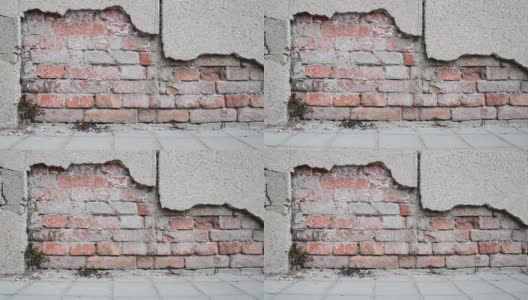 老房子或建筑物地基不良，墙面灰泥开裂，背景为砖高清在线视频素材下载