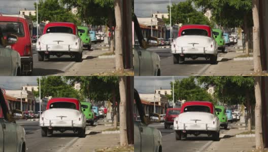 古巴大街上停着的老式经典美国车高清在线视频素材下载