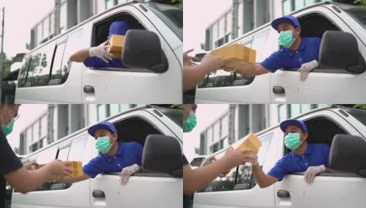 冠状病毒的概念。亚洲蓝色快递员戴着防护面具和医用橡胶手套在货车上给客户送包裹。4k分辨率和慢动作拍摄。高清在线视频素材下载
