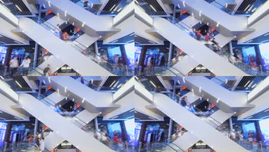 时光流逝自动扶梯在现代购物中心的人群中。非常繁忙，挤满了客户。高清在线视频素材下载