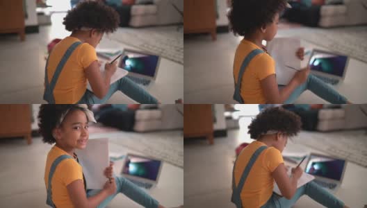 一个小学女孩在家学习的肖像高清在线视频素材下载