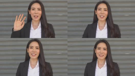 POV:微笑的亚洲女商人挥手欢迎顾客或同事。视频电话会议。远程工作的概念高清在线视频素材下载