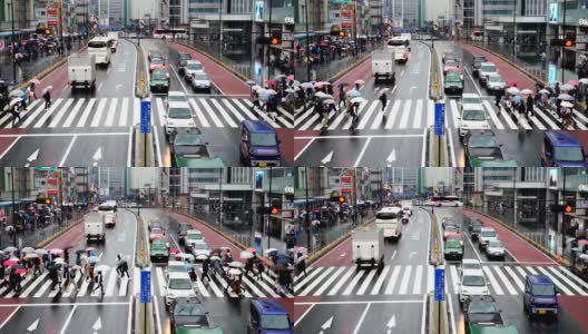 日本东京新宿商务区，日本人拥挤在新宿JR车站大楼之间的街道上。高清在线视频素材下载