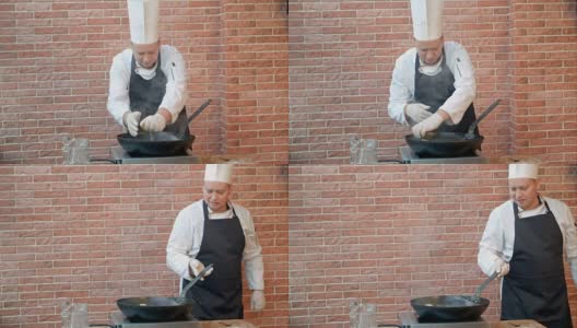 餐厅厨师用平底锅煎海鲜饺，榨柠檬汁高清在线视频素材下载
