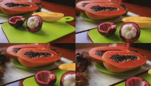 餐桌上有异国情调的热带水果。泰国的水果。特写镜头高清在线视频素材下载