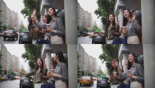 一群女性朋友在雨天找出租车高清在线视频素材下载
