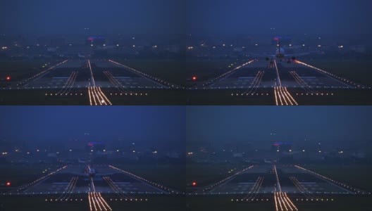 夜间，一架商用飞机在成都机场降落。高清在线视频素材下载