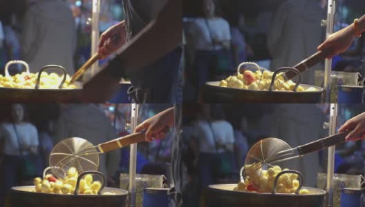 泰国清迈路街上的炸猪肉球高清在线视频素材下载