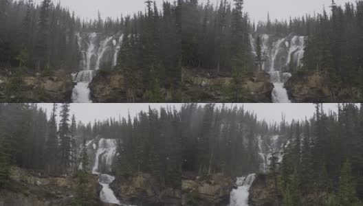 雪域加拿大森林中的壮观瀑布高清在线视频素材下载