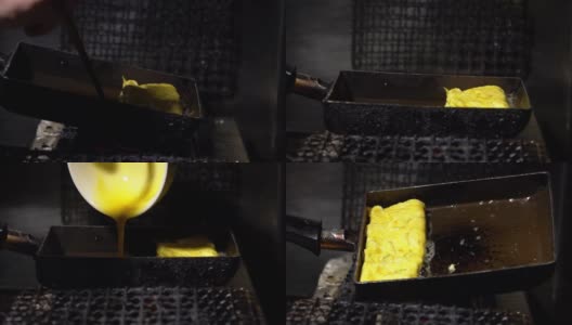 慢镜头拍摄在街头小吃市场的金属锅里的玉烧煎蛋卷高清在线视频素材下载