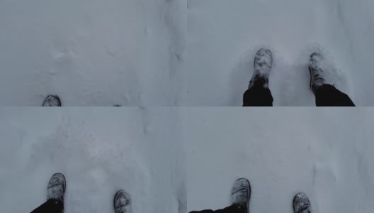 两个人在下雪的路上走着。两个人的腿。在冬天走在路上高清在线视频素材下载