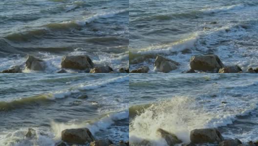 海浪拍打着大石头高清在线视频素材下载
