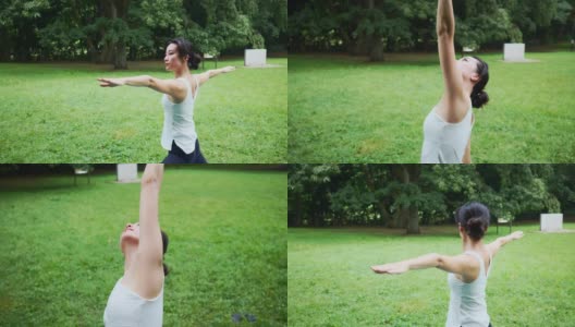 瑜伽教练在公园里摆武士姿势高清在线视频素材下载