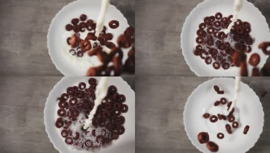 一碗巧克力环，牛奶从上面慢镜头倾泻而下高清在线视频素材下载
