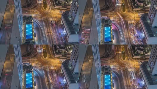 鸟瞰图的道路交叉口在一个大城市的夜晚时间推移高清在线视频素材下载
