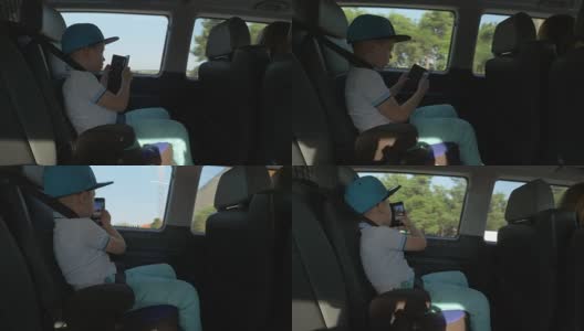 男孩开车时用手机拍照高清在线视频素材下载