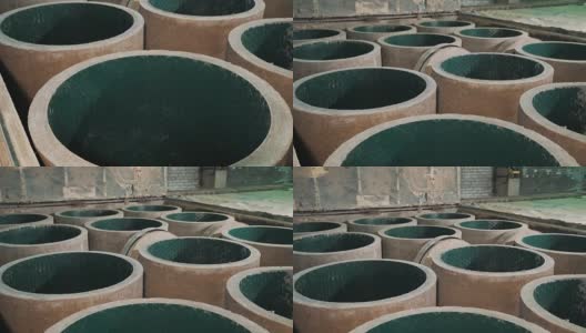 在工厂储存库处安装新的混凝土沙井，里面装有绿色塑料高清在线视频素材下载