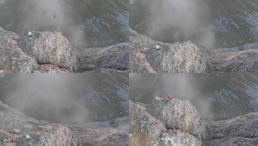 高空拍摄的极限跳绳从山顶。高清在线视频素材下载