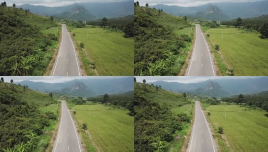 1148号公路的航拍片段，这是一条蜿蜒的山路，连接泰国北部的南省和法尧省。高清在线视频素材下载