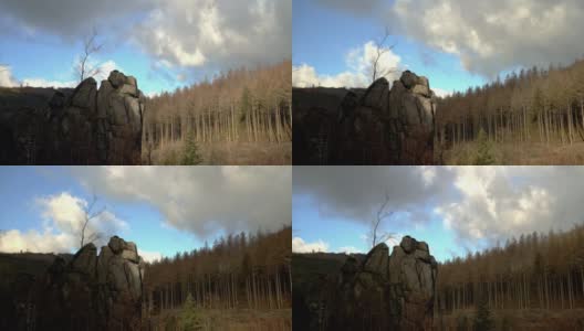 在阿德勒费尔森(Adlerfelsen)攀爬的岩石上移动的云的时间流逝高清在线视频素材下载