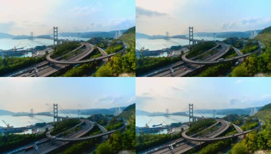 青马大桥的时间流逝。香港高速公路以悬吊结构建筑为交通出行理念，都市正午城市。高清在线视频素材下载