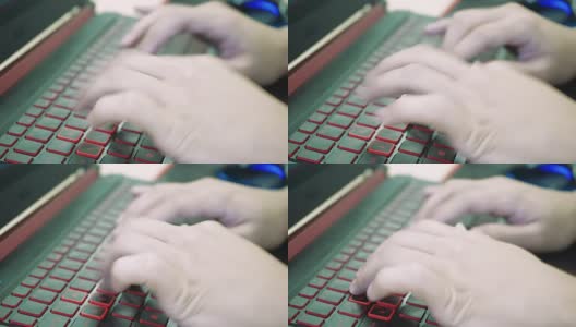 手在笔记本电脑键盘上打字，特写高清在线视频素材下载