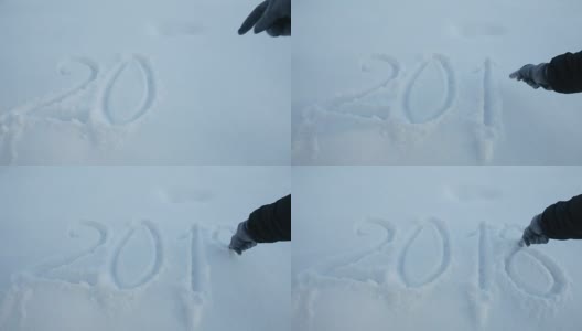 女人的手在白雪上写着2018高清在线视频素材下载