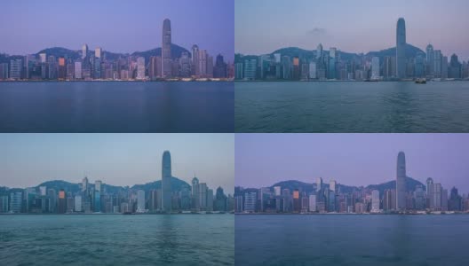 香港天际线与维多利亚港从黑夜到白天的时间间隔为4K高清在线视频素材下载