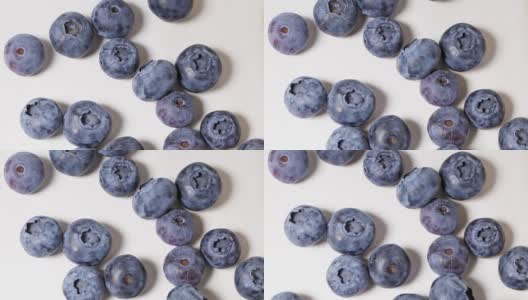 用平底锅翻炒新鲜的蓝莓高清在线视频素材下载