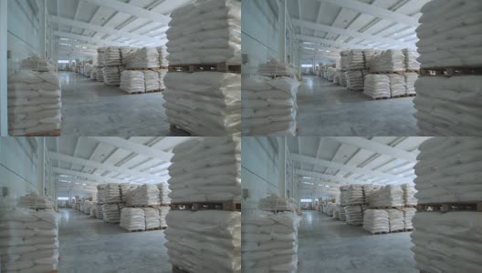 在一个袋装的仓库里，大米、粗磨粉和面粉准备好送给消费者高清在线视频素材下载