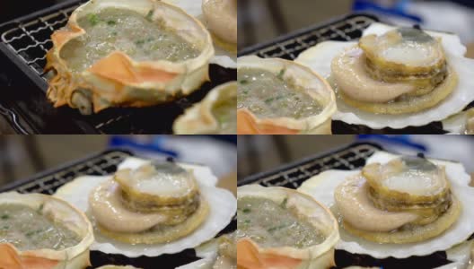 日本鱼市烤的海鲜扇贝高清在线视频素材下载