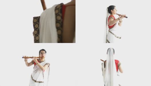 印度妇女玩Bansuri高清在线视频素材下载