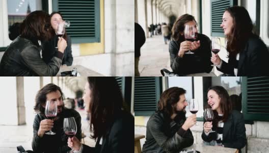 幸福的约会情侣在街头咖啡馆喝酒高清在线视频素材下载