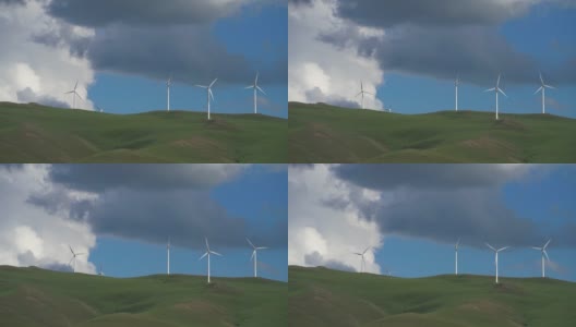 草原上风力涡轮机农场的鸟瞰图高清在线视频素材下载