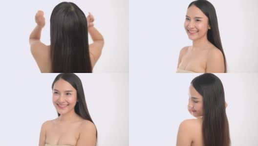 微笑女人的特写检查和看她的头发。白色背景下，年轻女性的肖像正在护理皮肤。亚洲女性美容理念高清在线视频素材下载