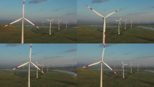 夕阳下的风车或风力涡轮机高清在线视频素材下载