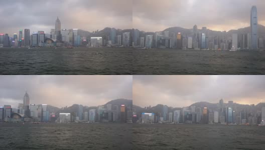 从维多利亚港眺望香港城市天际线全景。高清在线视频素材下载