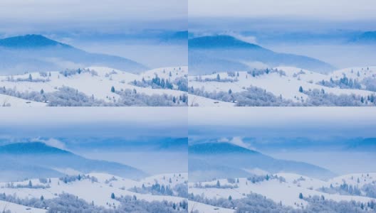 山峰上的雪被风吹走了。冬天的风景。天很冷，下着雪。高清在线视频素材下载